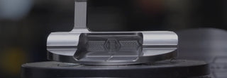 PUTTERS